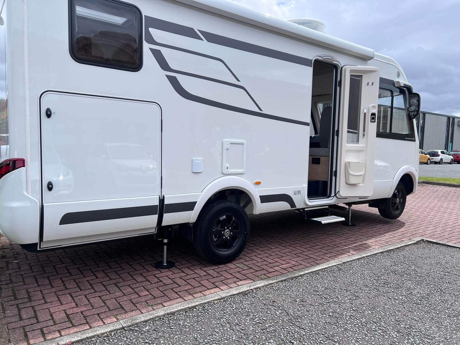 HPC motorhome levelling system on a parked Mercedes Sprinter Hymer